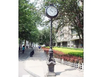 Outdoor pedestal clock with Roman Numerals